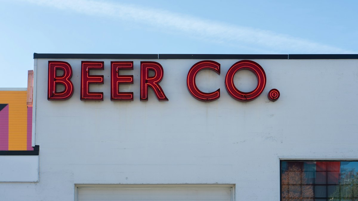 Original OCDIR directory artwork for Laguna Beer Company — not a business photograph
