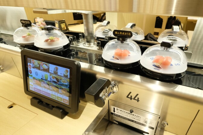 Original OCDIR directory artwork for Kura Sushi USA — not a business photograph