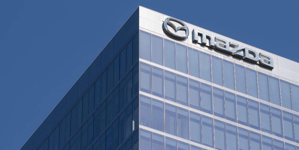 Original OCDIR directory artwork for Mazda North American Operations — not a business photograph